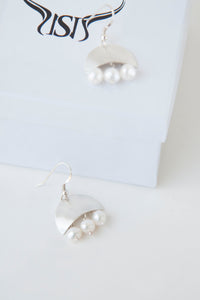 Curved half moon pearl earrings